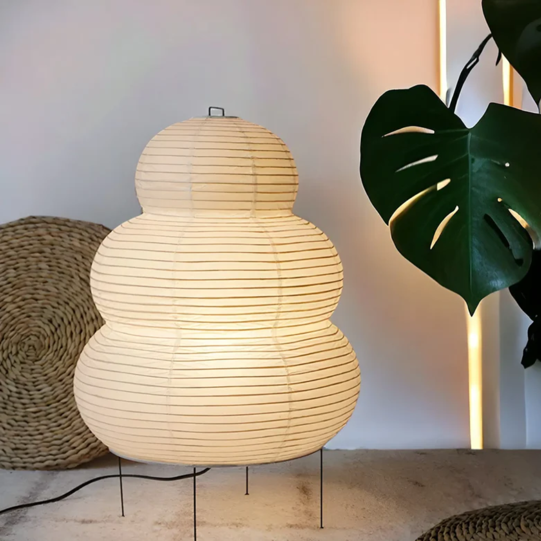 Minimalist Japanese rice paper floor lamp, SereneAura, offering soft ambient light for a tranquil living space.