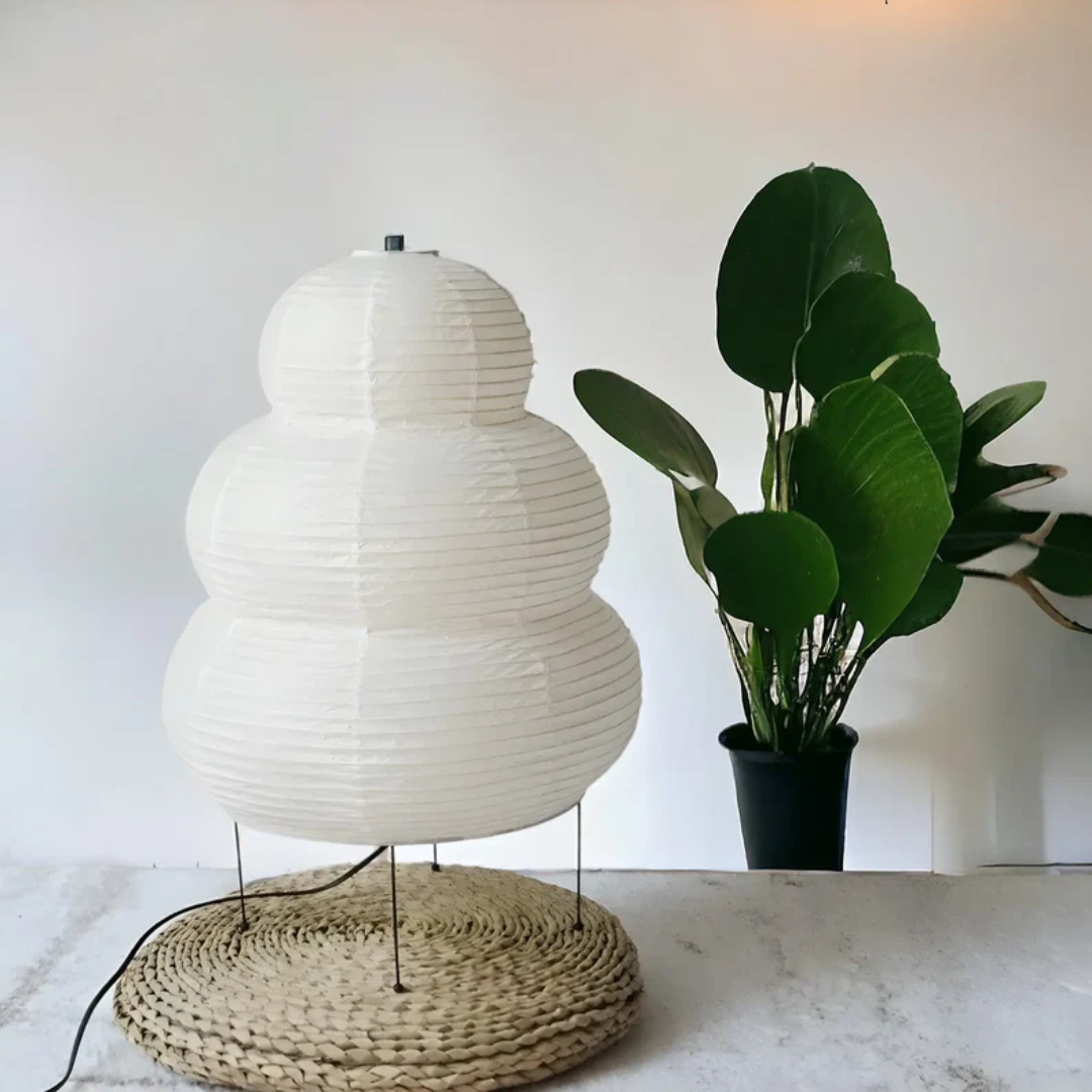 Unique Japanese Wabi-Sabi floor lamp with rice paper shade, providing serene ambient light for home decor.