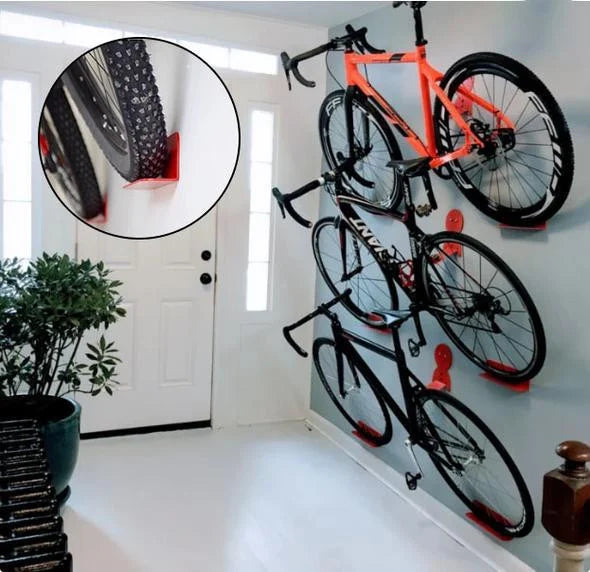 Wall-mounted bike hanger rack for space-saving bicycle storage. Heavy-duty pedal hook design, ideal for garage organization.