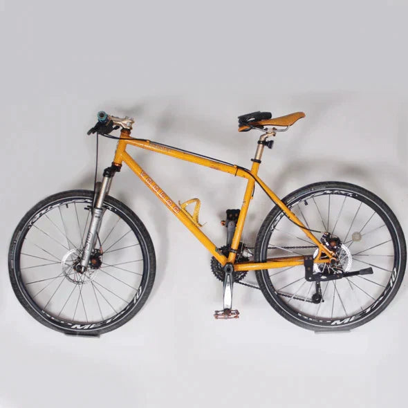 Unisex wall-mounted bike hanger rack. A space-saving bike accessory, perfect for efficient garage organization & bike storage.