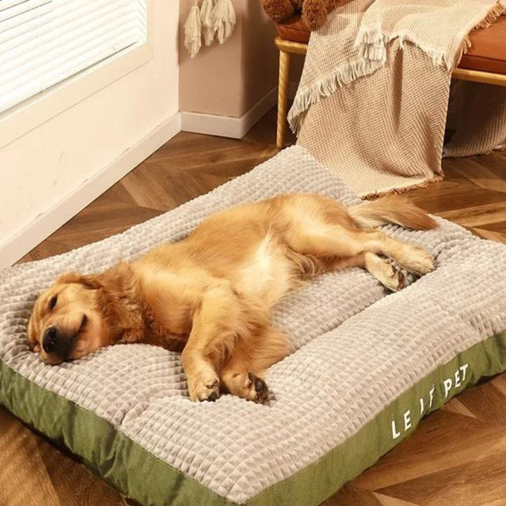 Comfortable dog bed made with warm fleece material, ideal for a cozy nap. Washable for easy care.