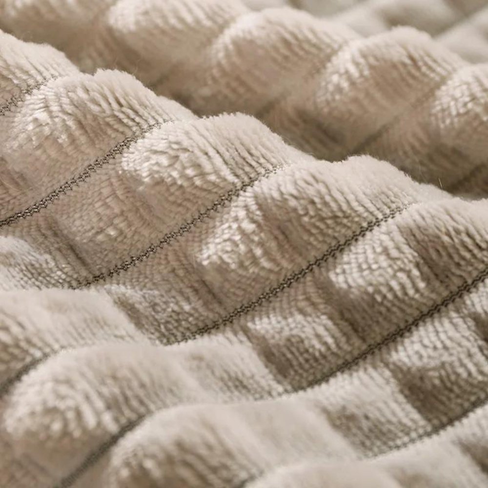 Small dog bed made of warm, ultra-soft fleece. A comfortable, washable pet bed for restful slumber.