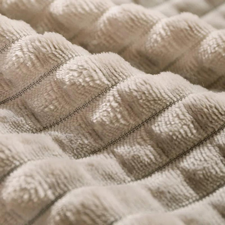 Small dog bed made of warm, ultra-soft fleece. A comfortable, washable pet bed for restful slumber.