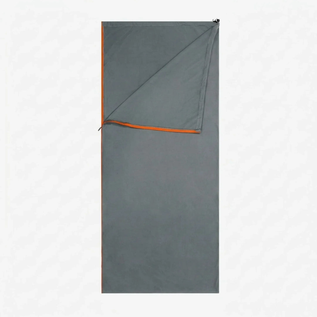 Unisex fleece sleeping bag liner, warm & versatile for camping, backpacking, and hostel travel.