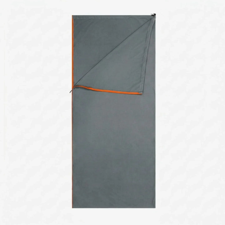 Unisex fleece sleeping bag liner, warm & versatile for camping, backpacking, and hostel travel.