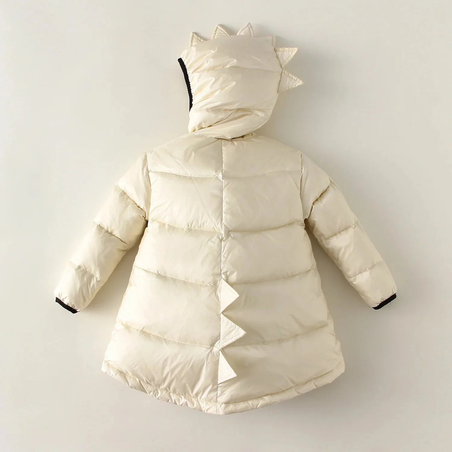 Cozy & warm green dino puffer jacket for children, ideal winter outerwear for chilly weather & outdoor fun.