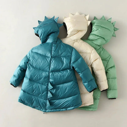 Adventure-ready green dino puffer jacket for kids, a warm, waterproof winter coat for playful exploration.