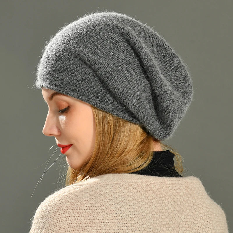 Cozy unisex grey knit beanie hat, ideal for keeping warm in winter & fall. Stylish headwear accessory.