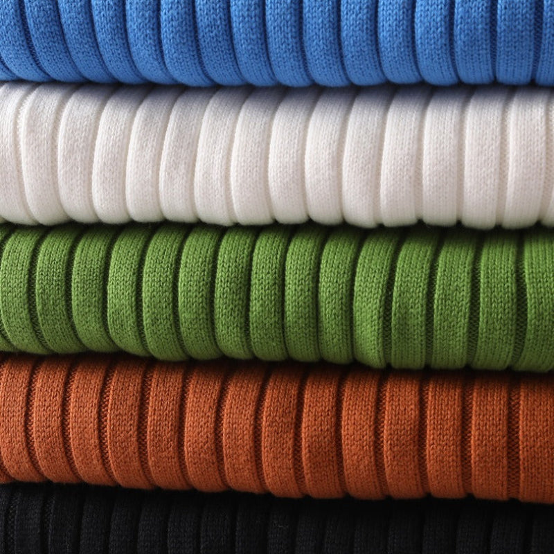 Stylish men's ribbed turtleneck sweater, a comfortable long sleeve knit for cold weather fashion.