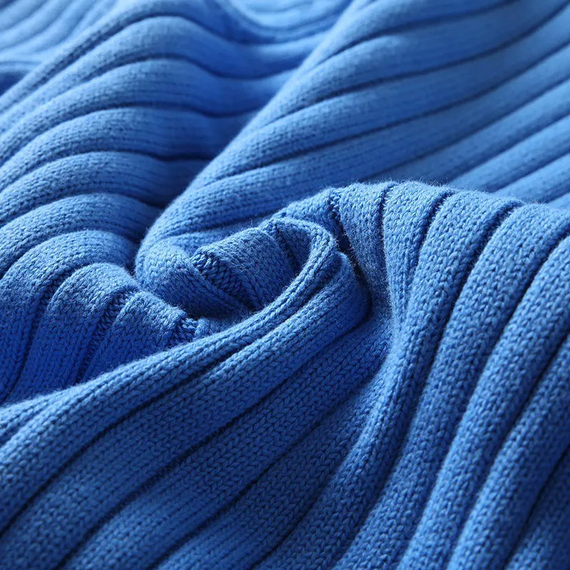 Men's cozy ribbed turtleneck sweater, perfect for layering or as a warm standalone winter top.