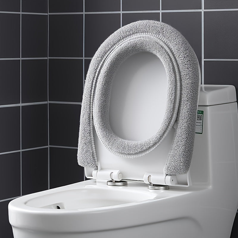 Hygienic & soft toilet seat cushion, provides warmth & comfort, reusable bathroom essential.