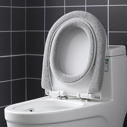 Hygienic & soft toilet seat cushion, provides warmth & comfort, reusable bathroom essential.