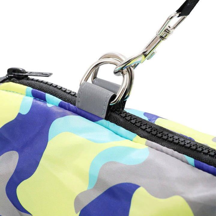 Stylish reflective dog jacket, waterproof & warm, ensures pet comfort in winter.