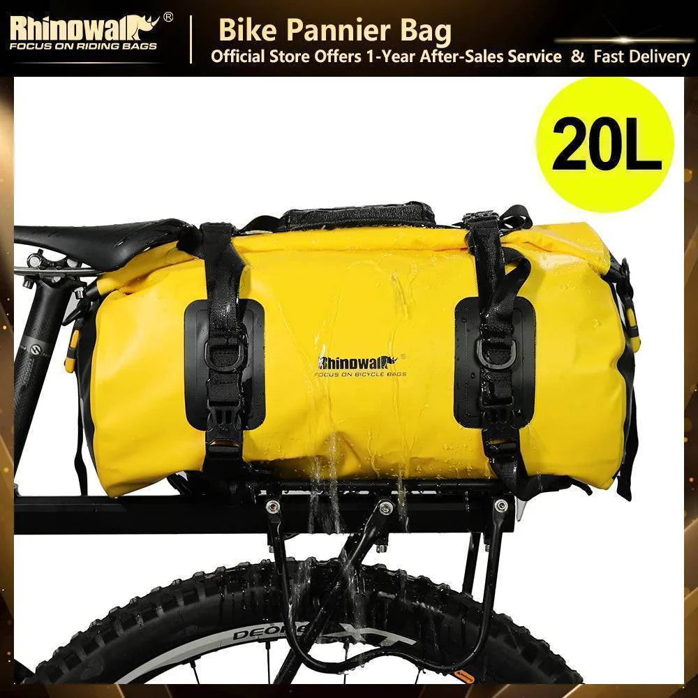 Waterproof cycling pannier bag 20L mounted on a bike rear rack, perfect for road or MTB travel.