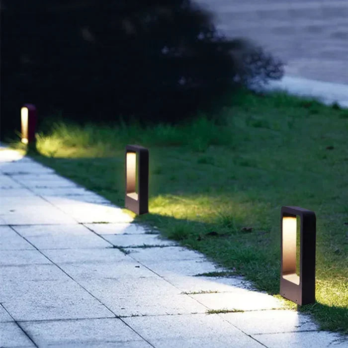 Waterproof LED ground spot light for garden & landscape lighting, ideal for pathways. Modern gray housing.