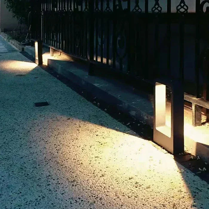 Energy-efficient LED ground spot, waterproof outdoor lighting for gardens, patios, and landscape pathways. Gray design.