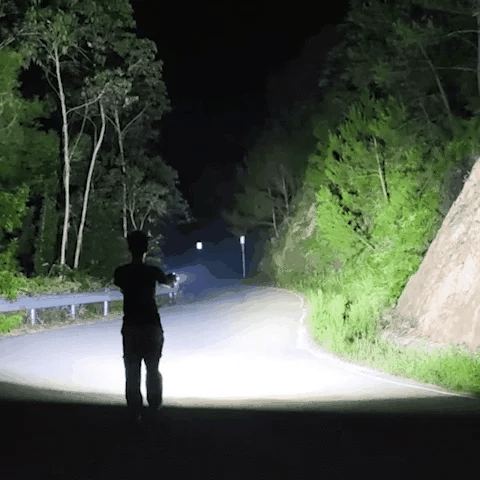 Essential survival gear: ultra-bright LED flashlight for camping, hiking, and outdoor adventures. Waterproof & durable.
