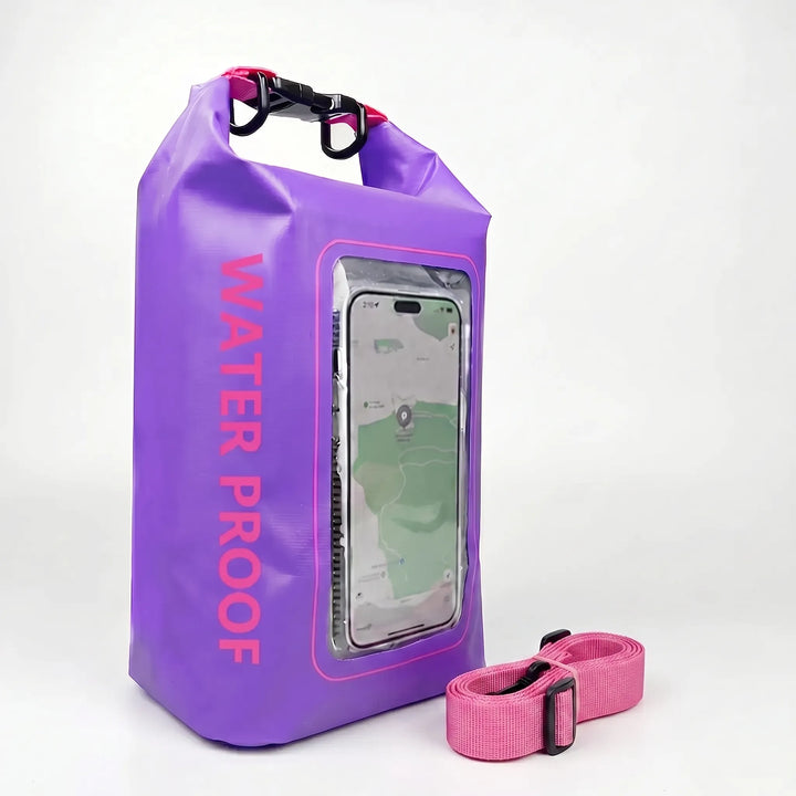 Camping gear dry bag with roll-top seal & clear touchscreen window for maps or phone use.