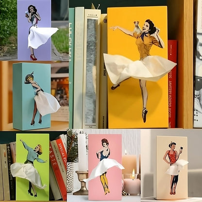 Whimsical flying skirt tissue box holder, a unique home decor accent for living rooms.