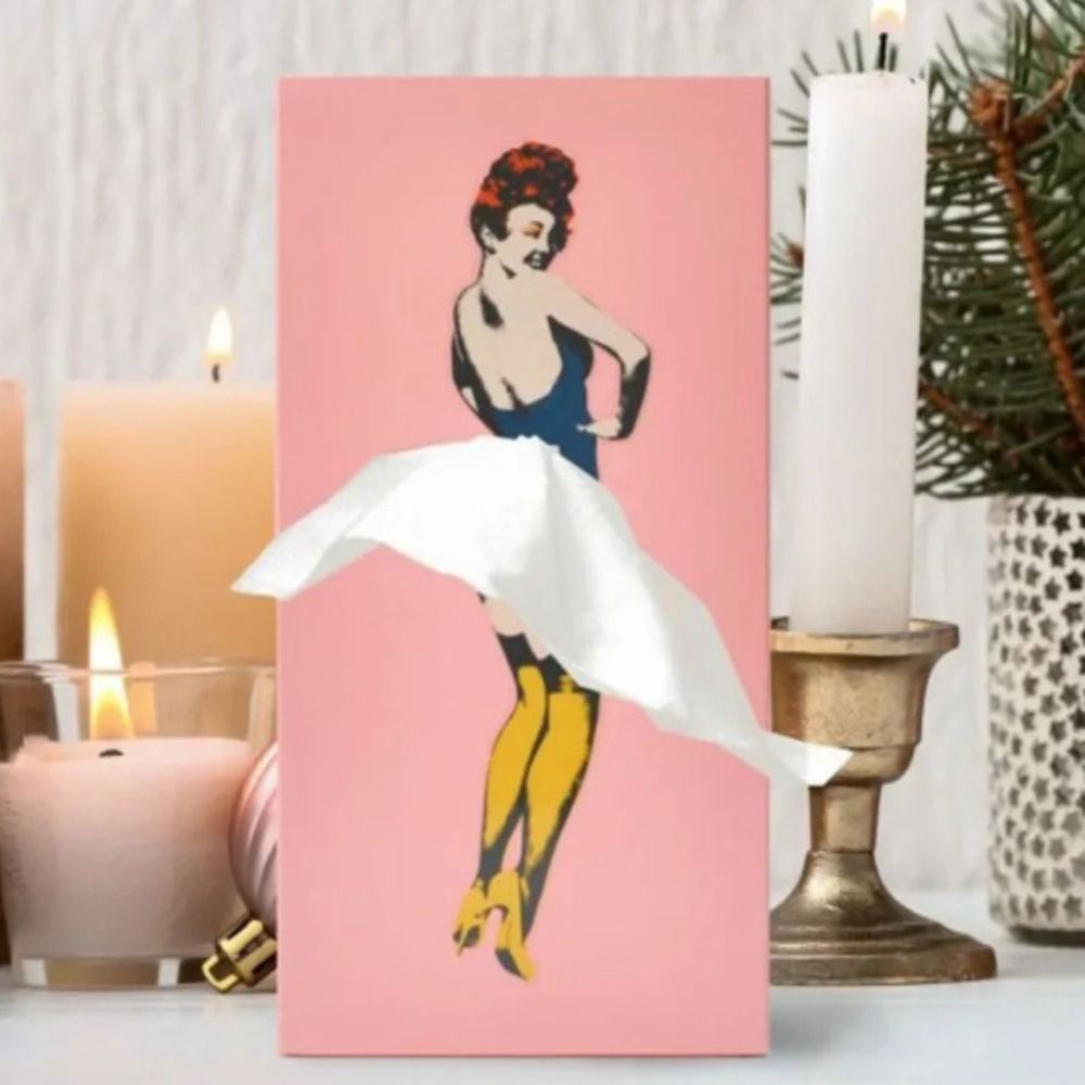 Colorful flying skirt tissue box holder, a whimsical and unique decorative accent for contemporary homes.
