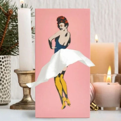 Colorful flying skirt tissue box holder, a whimsical and unique decorative accent for contemporary homes.