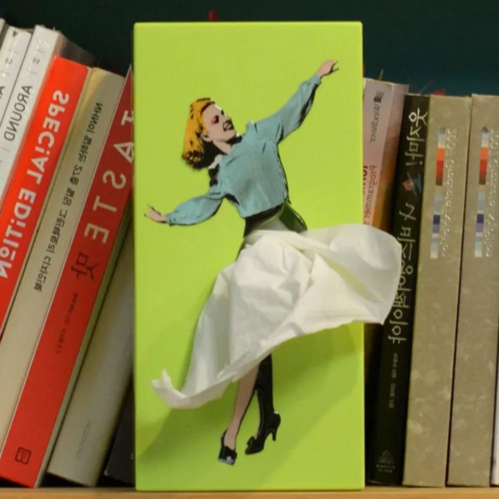 Decorative flying skirt tissue box holder, a playful and colorful accessory for modern home decor.
