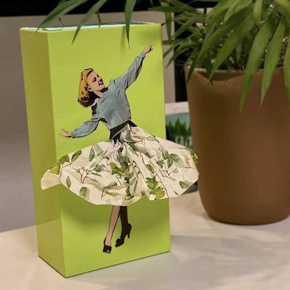 Decorative flying skirt tissue box, a uniquely designed, whimsical holder perfect for stylish home decor.