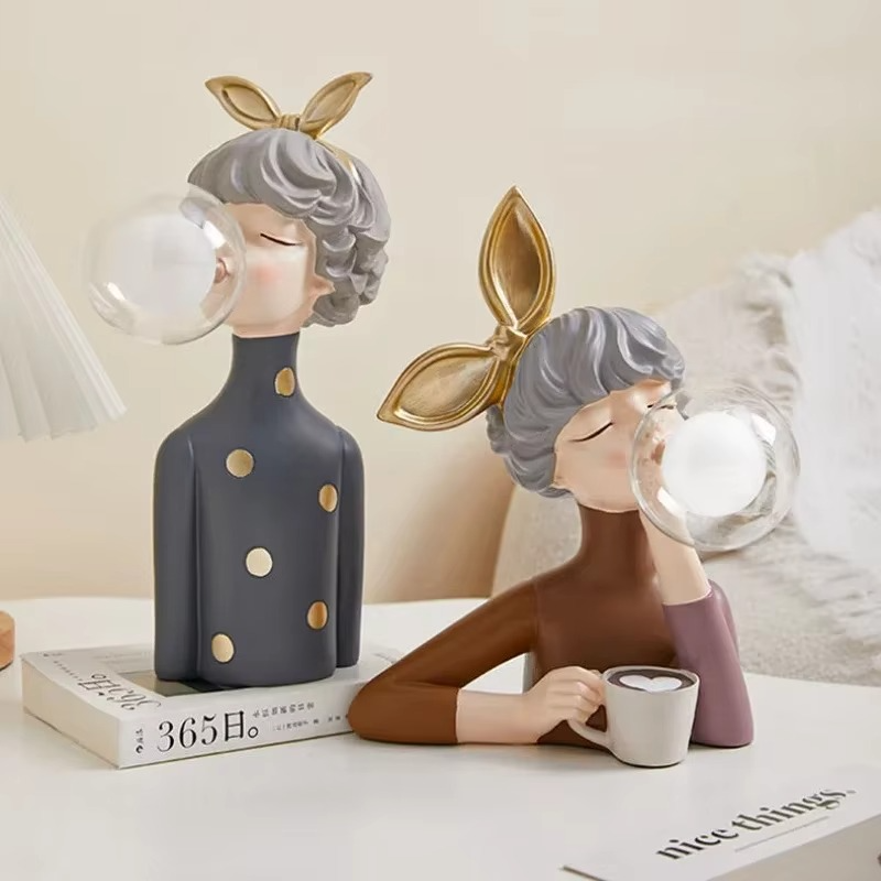 Artistic girl figurine table lamp. A unique resin sculpture and decorative light for enchanting living room or bedroom decor.