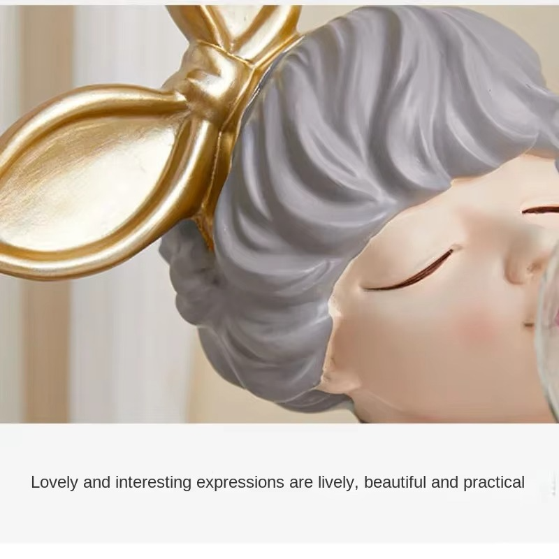Enchanting girl figurine ambient lamp. This decorative resin sculpture offers unique lighting for bedroom or office decor.