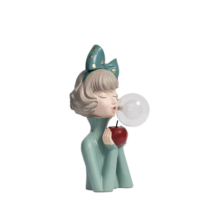 Decorative whimsical girl figurine table lamp. A charming resin sculpture providing ambient lighting for any home decor.