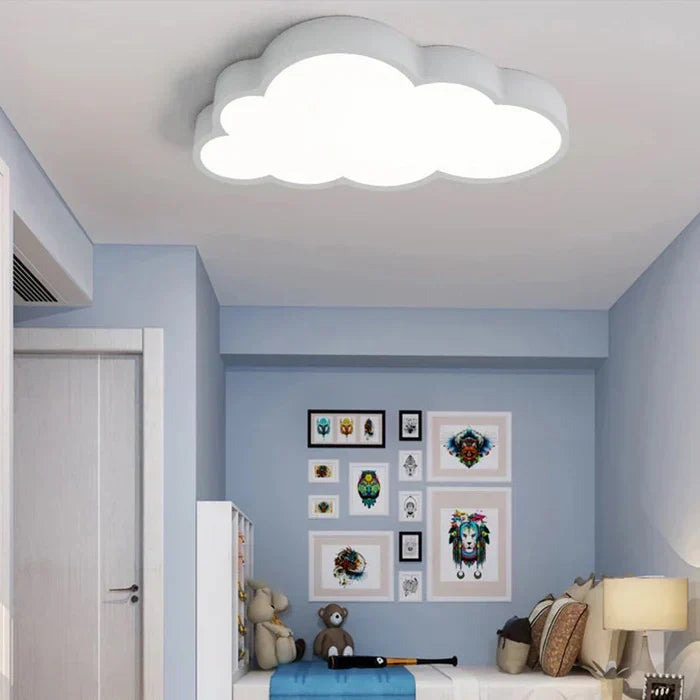 Modern white cloud-shaped LED plafond lamp, perfect for children's room lighting and whimsical playroom decor.