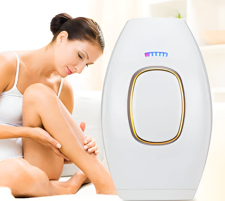 Compact white & pink permanent laser hair removal handset, ideal for portable at-home body grooming & skin care.