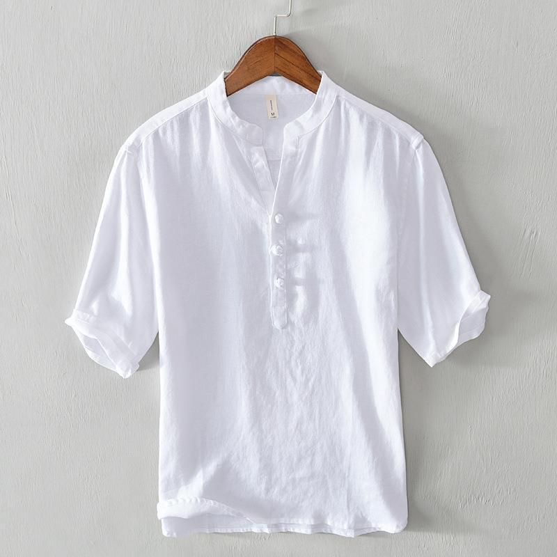 White relaxed fit men's button-up shirt for casual summer wear. Breathable everyday collared top.