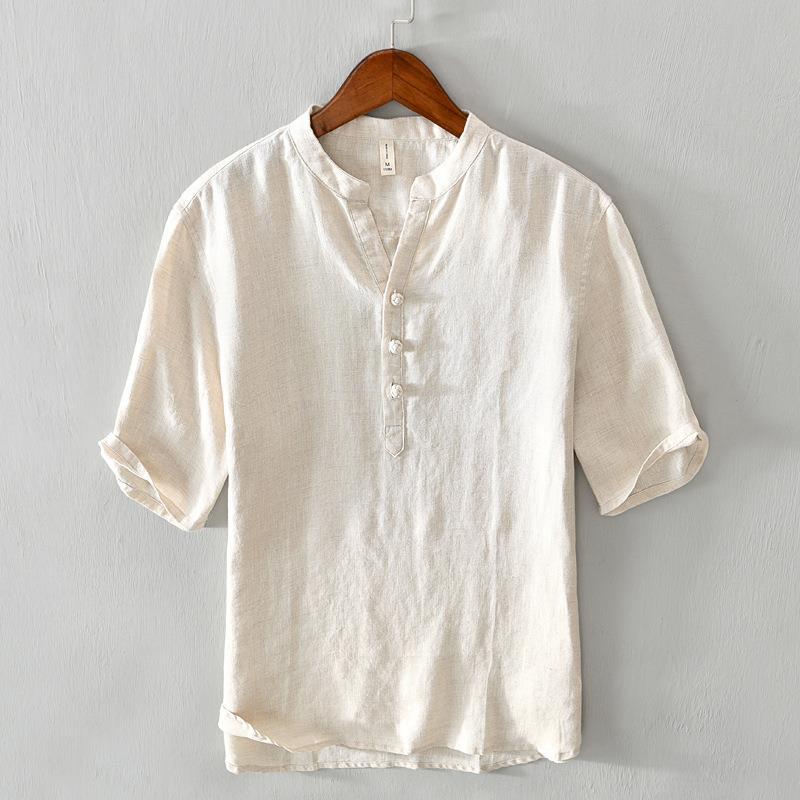 Beige relaxed fit men's button-up shirt, casual summer wear. Breathable, versatile everyday collared top.