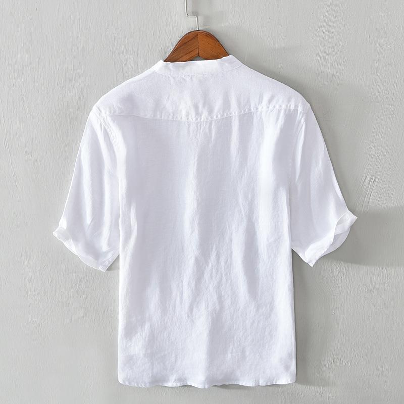 Men's relaxed fit casual button-up shirt, versatile summer wear. Breathable collared top for everyday style.