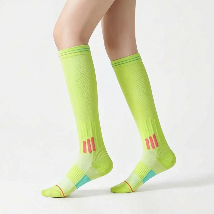 Performance white women's knee-high socks, great for any athletic activity.