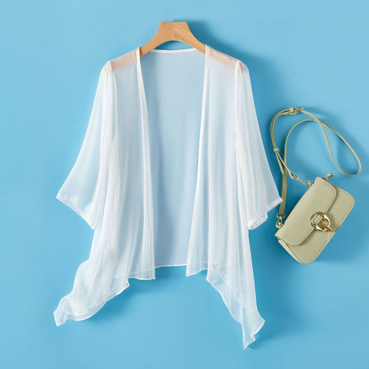 White women's sheer lightweight open-front cardigan. Perfect elegant summer resortwear cover-up for chic style.