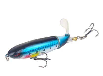 Detailed view of Whopper Plopper fishing lure's rotating tail mechanism