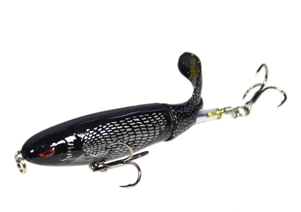 Whopper Plopper topwater bait, rotating tail creates commotion on water surface
