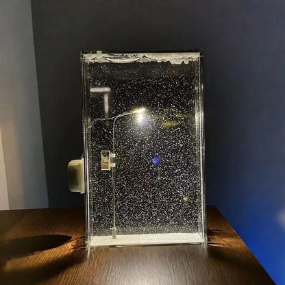 Cozy Winter's Veil LED Snowfall Light, an ambient desktop night light creating a festive and warm atmosphere.