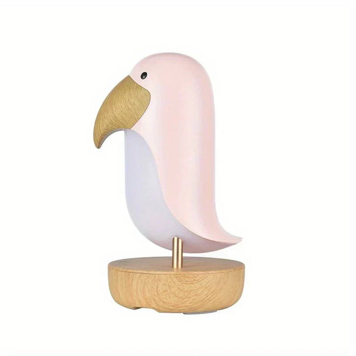 Woodpecker-style wireless bird night light, a rechargeable ambient lamp. Adds warm, cozy light to bedroom or nursery.
