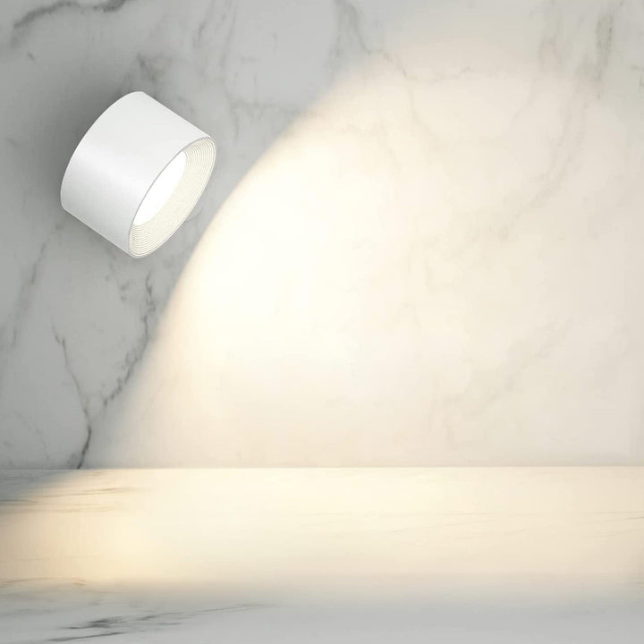 Rechargeable wireless wall lamp, 360° rotating, dimmable LED light for flexible use.