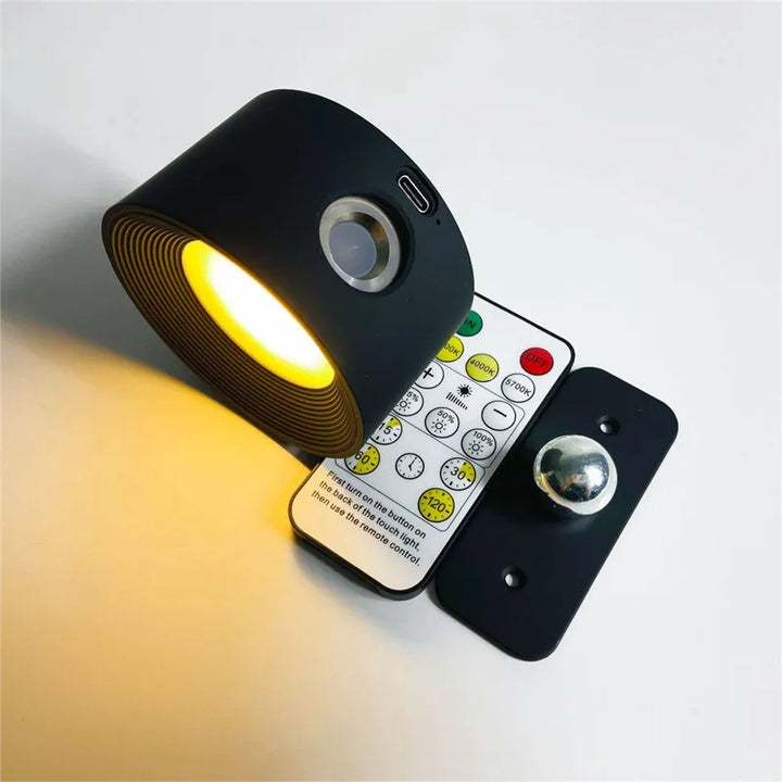 Dimmable wireless LED wall lamp, rechargeable, 360° rotating head, perfect for flexible lighting.