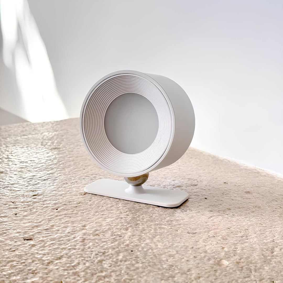 Modern flexible LED wall light, wireless and dimmable, 360° rotating rechargeable lamp.