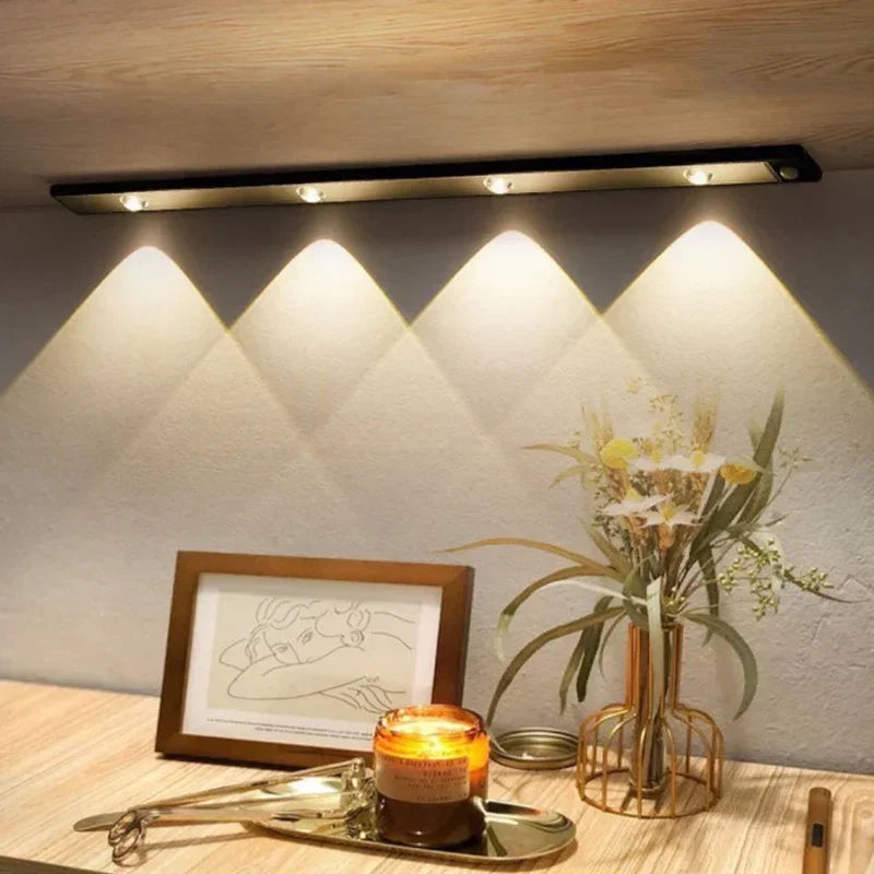 Magnetic wireless LED light bar with motion sensor, ideal for smart home cabinet & wardrobe lighting.