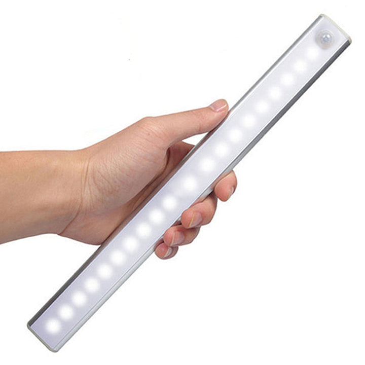 Wireless LED night light with motion sensor for automatic illumination in dark spaces.