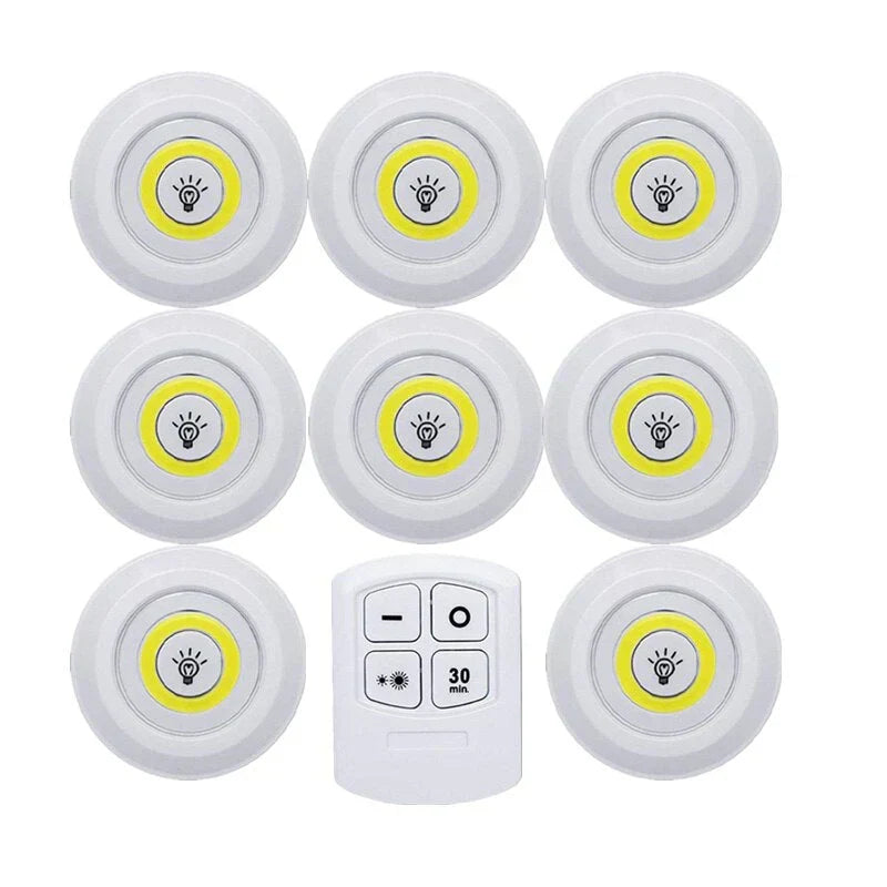 Remote-controlled LED puck lights with timer function, perfect for automated wireless home lighting.