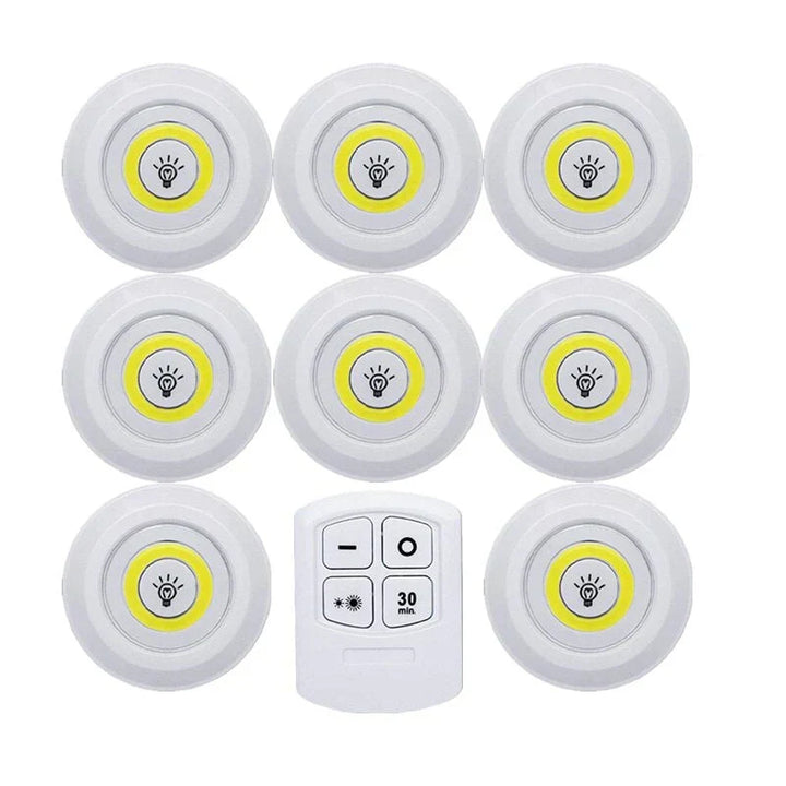 Remote-controlled LED puck lights with timer function, perfect for automated wireless home lighting.