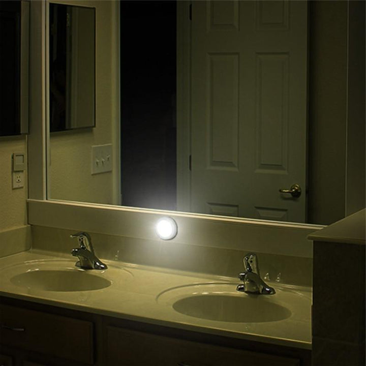 Battery operated wireless LED night light with motion sensor for automatic illumination. No wiring needed.