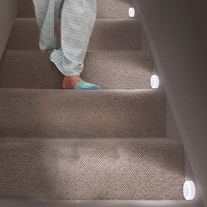 Wireless motion sensor LED night light; battery-operated for quick, easy installation anywhere. Perfect safety light.